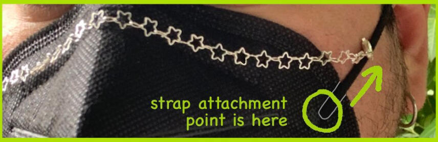 wearing a chain higher on the strap to keep it in place on the nose